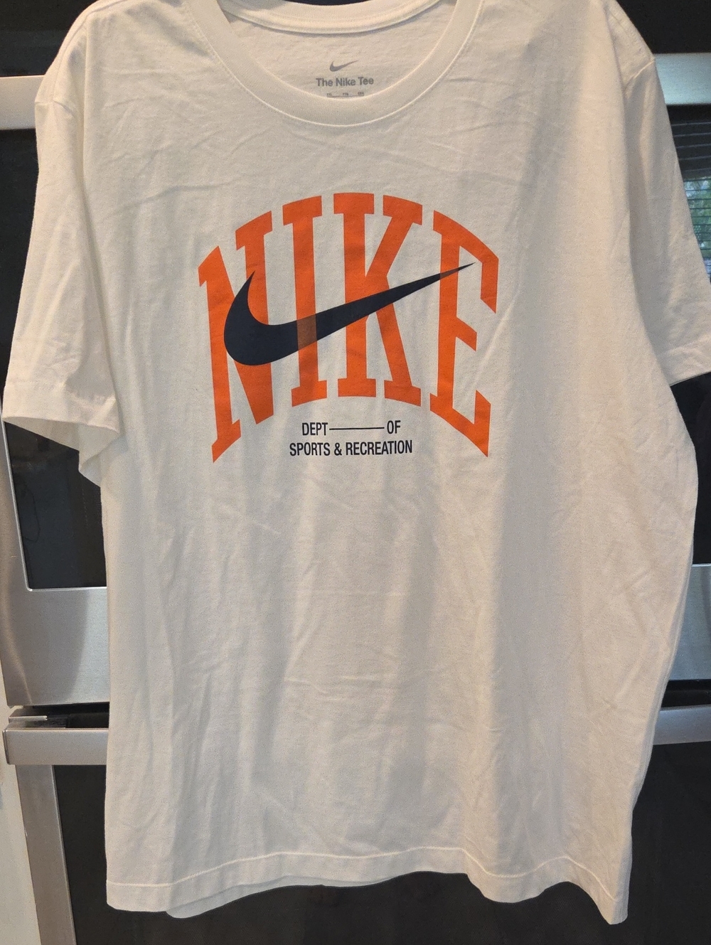 Nike White Short Sleeve Tee with Orange Logo and Navy Swoosh